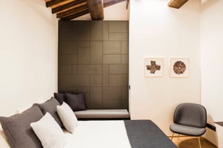 Deluxe room with balcony and gray upholstery