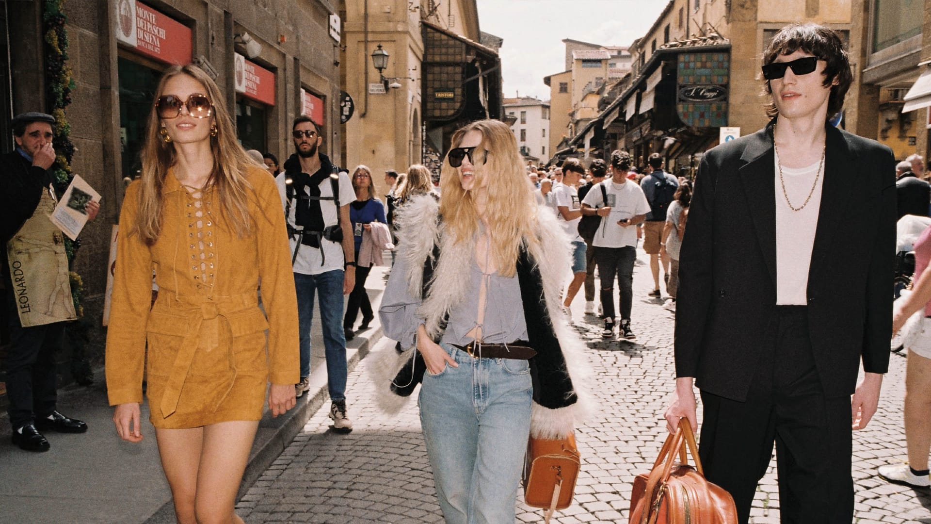 Young people walking through the streets of Florence