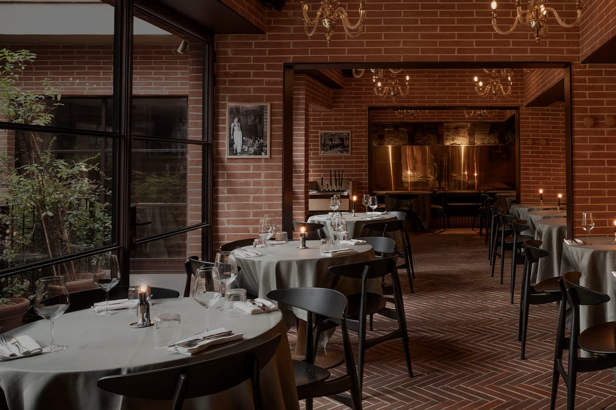 Indoor restaurant room with set tables