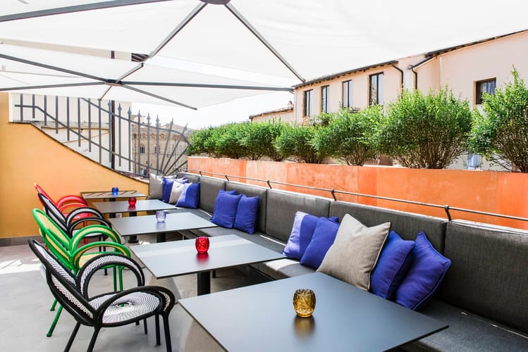 Terrace with seating at Hotel Milù